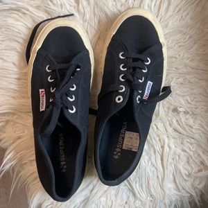 Black women’s Superga sneakers